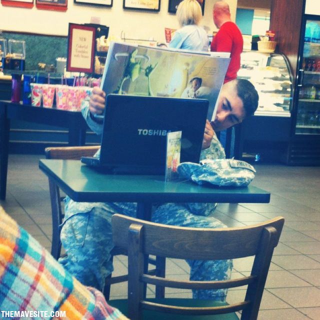SoldierReadingAStorybookToHisChildOverSkype.jpg